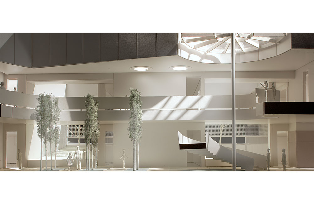 Image 6. Sectional model showing central courtyard with circular skylight and modern spiral staircase.