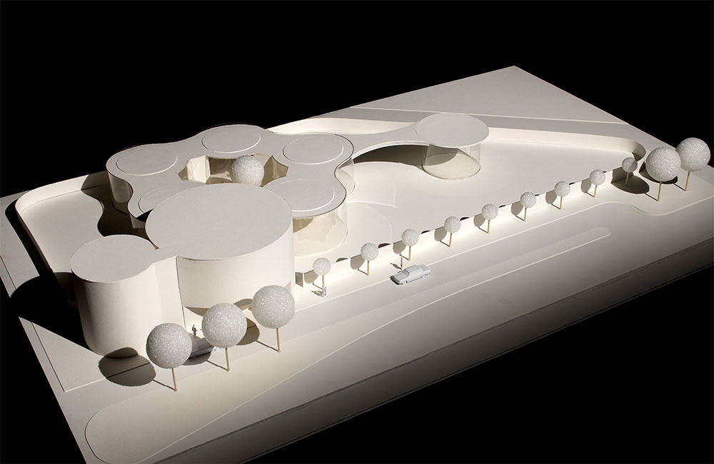Image 3. Left corner aerial view of building model showing main entrance and overall site.