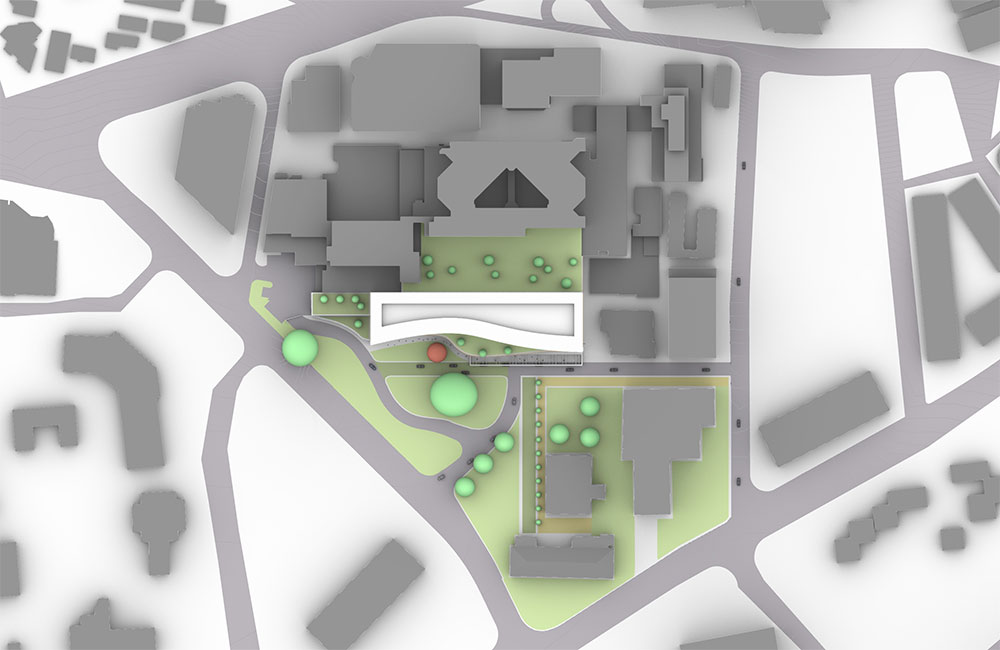 Image 4. Site plan showing linear central building with a curved facade.
