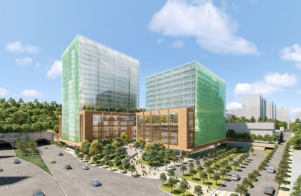 Image 7. Exterior corner rendering of 2 modern hospital towers with a plaza located in between them.